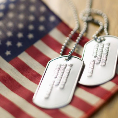 American flag and dog tags