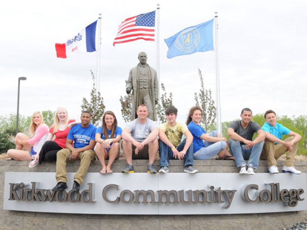 students sitting on the roundabout