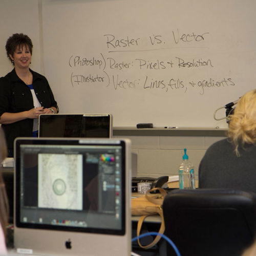 Sheralyn Schultz teaches a graphic design class at Kirkwood’s Jones County Regional Center