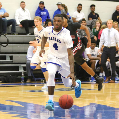 Nick Richards moves the ball up the court