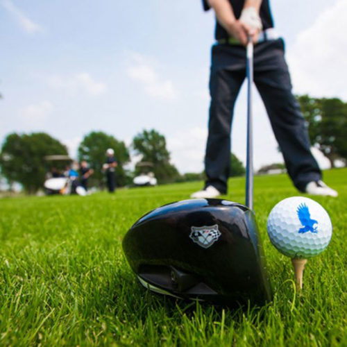 golfer about to tee off