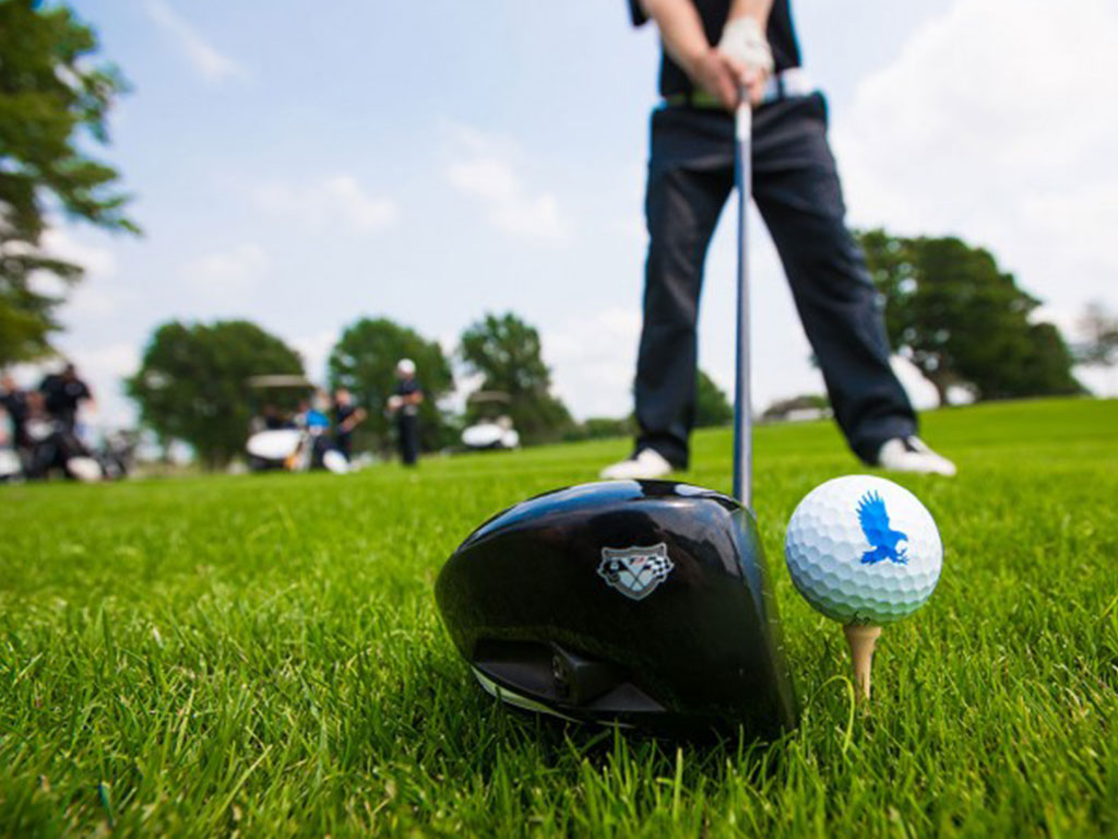 golfer about to tee off