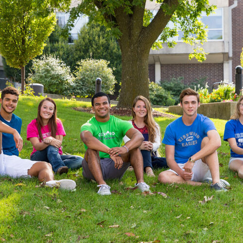 Students on a hill featured