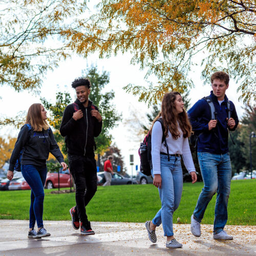 students-walking-outside-featured