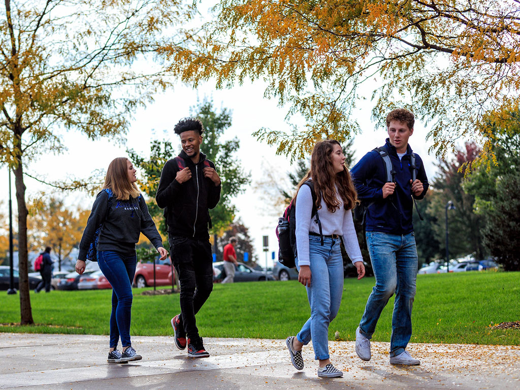 students-walking-outside-featured