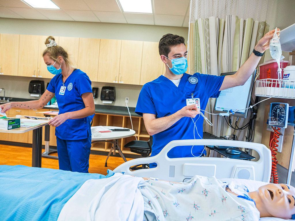 Nursing-Students-Setting-Up-IV