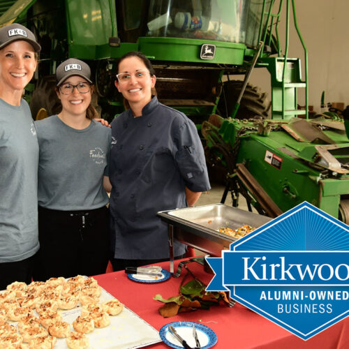 Feedwell-Employees-in-Front-of-Farm-Machinery