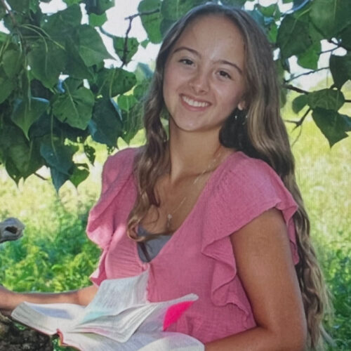 Macy-Reading-While-Sitting-on-a-Tree-Featured