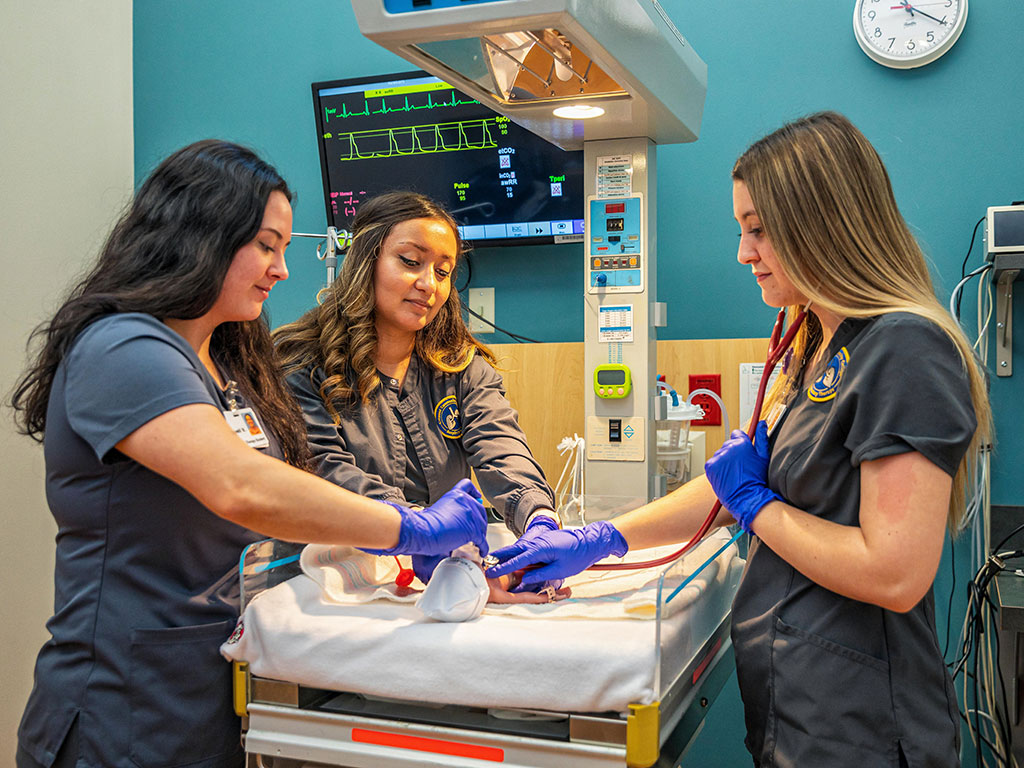 Three-Health-Students-During-a-Simulation-Featured