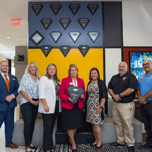 Hotel-Employees-with-Four-Diamond-Awards-in-the-Lobby-Featured