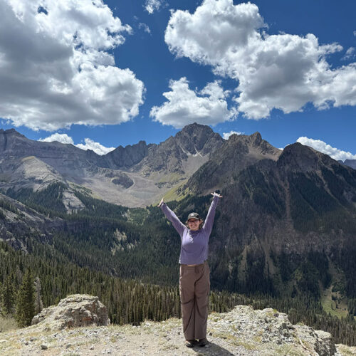 Rylee-Steffen-Standing-in-Front-of-Mountains-Featured
